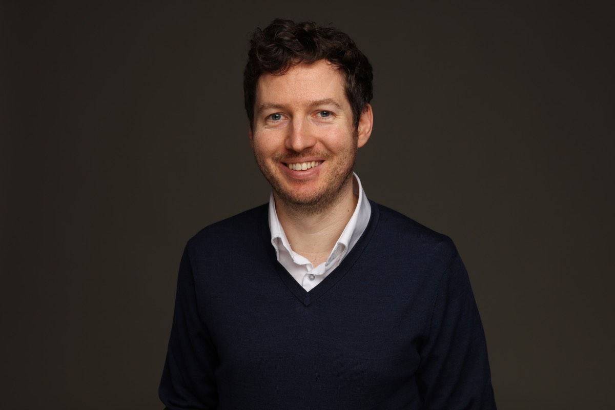 Dr. Adam Keane